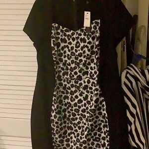 Plus size form fitted black dress to the knee leopard in the front panel